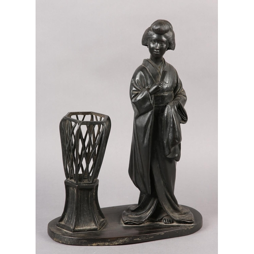 286 - A JAPANESE BRONZE TABLE LAMP in the form of a bijin standing beside a raised basket, on oval base, s... 