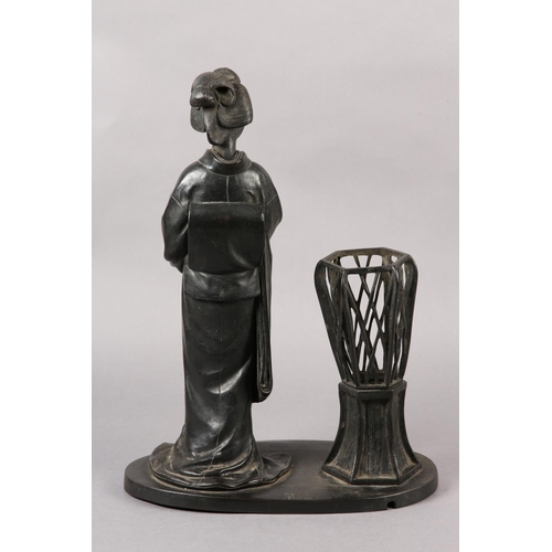 286 - A JAPANESE BRONZE TABLE LAMP in the form of a bijin standing beside a raised basket, on oval base, s... 