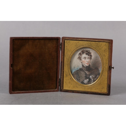 298 - A MID TO LATE 19TH CENTURY PORTRAIT MINIATURE OF A YOUNG SCOTTISH OFFICER, curled hair, high collare... 