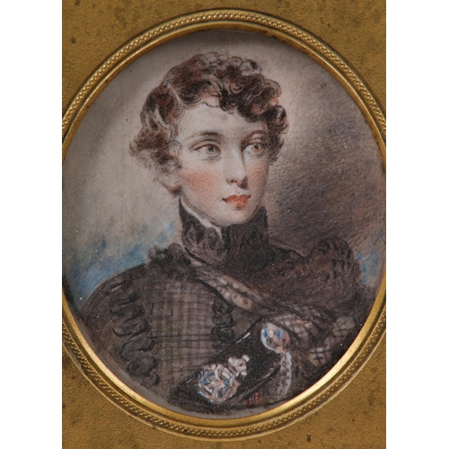 298 - A MID TO LATE 19TH CENTURY PORTRAIT MINIATURE OF A YOUNG SCOTTISH OFFICER, curled hair, high collare... 