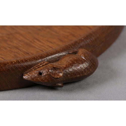 457 - THOMPSON OF KILBURN 'MOUSEMAN', An oak kidney-shaped tray with raised rim, carved in relief with two... 