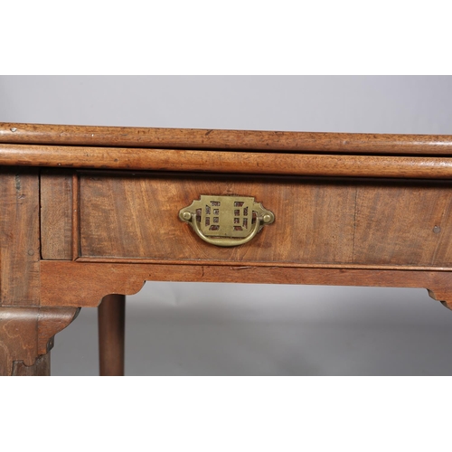 478 - A GEORGE III MAHOGANY TEA TABLE having a rectangular fold over top above a drawer to the apron, late... 