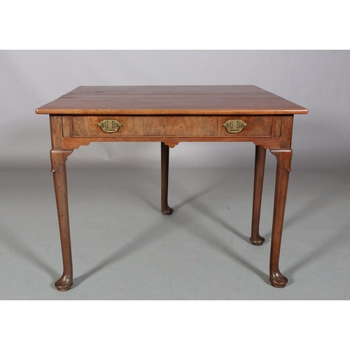 478 - A GEORGE III MAHOGANY TEA TABLE having a rectangular fold over top above a drawer to the apron, late... 