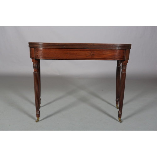 480 - A REGENCY MAHOGANY TEA TABLE, having a rectangular fold-over top with rounded corners, ebony line in... 