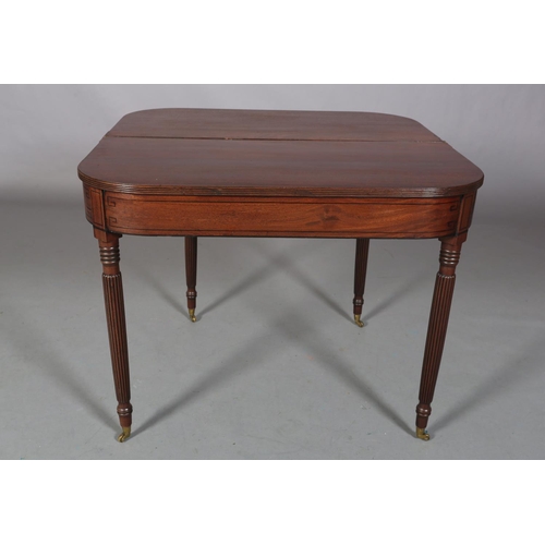 480 - A REGENCY MAHOGANY TEA TABLE, having a rectangular fold-over top with rounded corners, ebony line in... 