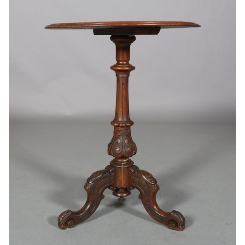 477 - A VICTORIAN FIGURED WALNUT TRIPOD TABLE, circular, on a fluted and foliate vase pedestal on three ca... 