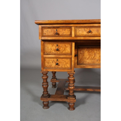 469 - A 19TH CENTURY FIGURED AND SATIN WALNUT DRESSING TABLE, possibly French, having three indented panel... 