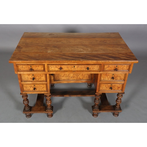 469 - A 19TH CENTURY FIGURED AND SATIN WALNUT DRESSING TABLE, possibly French, having three indented panel... 