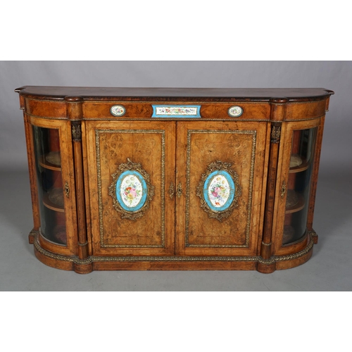 472 - A VICTORIAN FIGURED WALNUT CREDENZA OR SIDE CABINET with gilt metal mounts and floral painted porcel... 