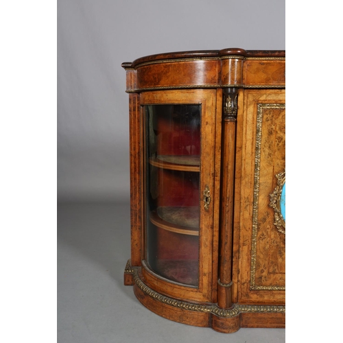 472 - A VICTORIAN FIGURED WALNUT CREDENZA OR SIDE CABINET with gilt metal mounts and floral painted porcel... 