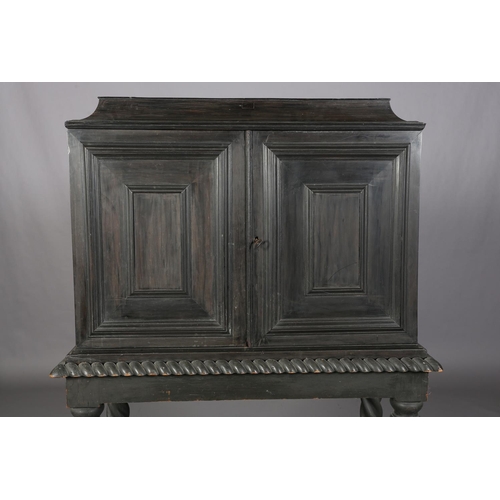 468 - A FLEMISH ANTWERP EBONY CABINET ON STAND, LATE 17TH CENTURY of rectangular form, concave moulded top... 