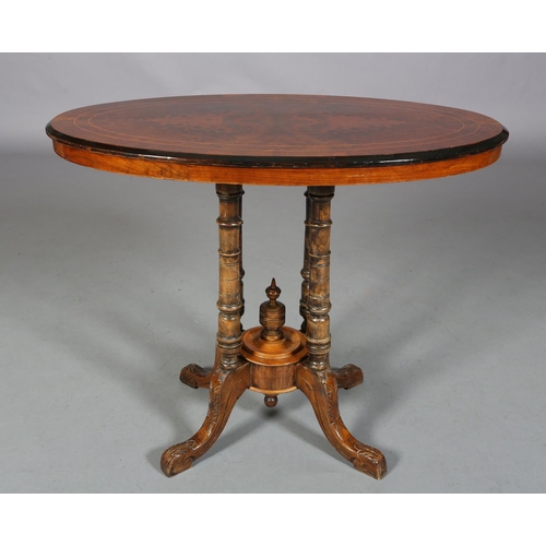 473 - A VICTORIAN BURR WALNUT OVAL WINDOW TABLE, inlaid in boxwood stringing and ebonised rim, on four tur... 