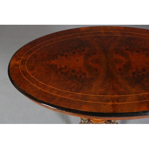 473 - A VICTORIAN BURR WALNUT OVAL WINDOW TABLE, inlaid in boxwood stringing and ebonised rim, on four tur... 