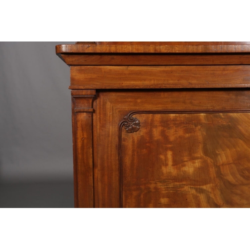 471 - AN EARLY 19TH CENTURY MAHOGANY BOOKCASE-CUPBOARD having a moulded cornice above two glazed tracery d... 