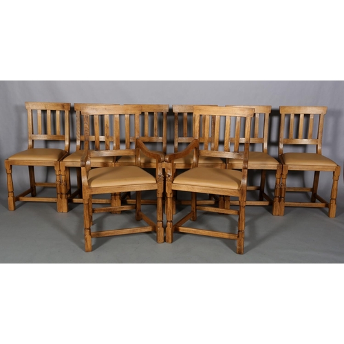 460 - TREVOR HUTCHINSON 'SQUIRRELMAN',  a set of eight oak dining chairs, each having a railed back, pale ... 