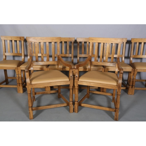 460 - TREVOR HUTCHINSON 'SQUIRRELMAN',  a set of eight oak dining chairs, each having a railed back, pale ... 