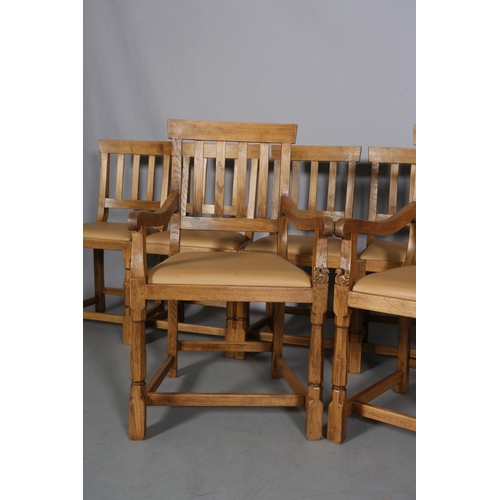 460 - TREVOR HUTCHINSON 'SQUIRRELMAN',  a set of eight oak dining chairs, each having a railed back, pale ... 