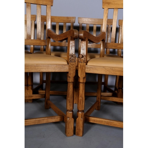 460 - TREVOR HUTCHINSON 'SQUIRRELMAN',  a set of eight oak dining chairs, each having a railed back, pale ... 