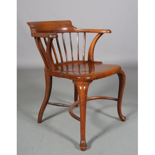 490 - AN 19TH CENTURY MAHOGANY BOW ARMCHAIR, having a railed back, full seat on cabriole legs joined by a ... 