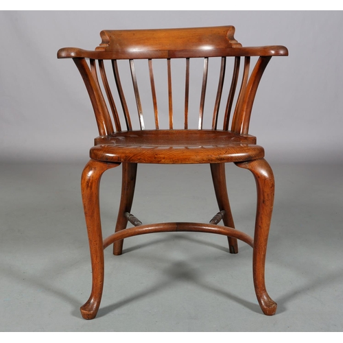 490 - AN 19TH CENTURY MAHOGANY BOW ARMCHAIR, having a railed back, full seat on cabriole legs joined by a ... 