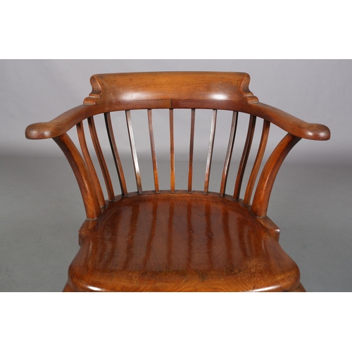 490 - AN 19TH CENTURY MAHOGANY BOW ARMCHAIR, having a railed back, full seat on cabriole legs joined by a ... 