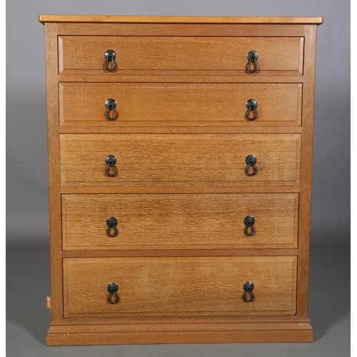 465 - COLIN ALMACK 'BEAVERMAN', an oak chest of five graduated drawers, iron loop handles, field panelled ... 