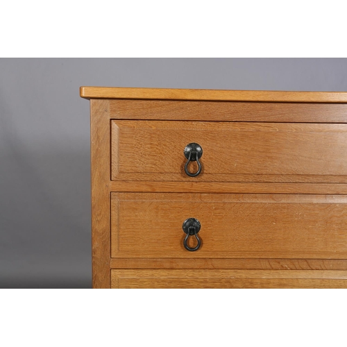 465 - COLIN ALMACK 'BEAVERMAN', an oak chest of five graduated drawers, iron loop handles, field panelled ... 