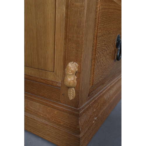 465 - COLIN ALMACK 'BEAVERMAN', an oak chest of five graduated drawers, iron loop handles, field panelled ... 