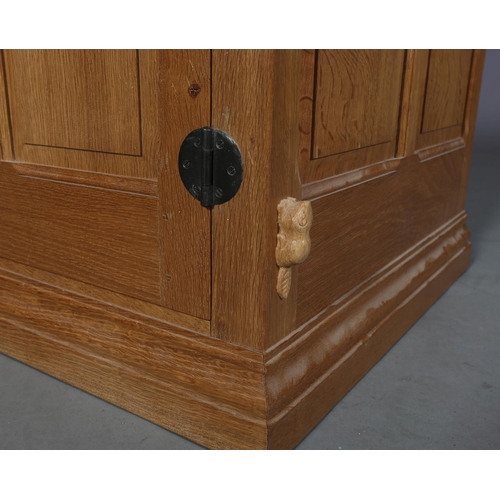 464 - COLIN ALMACK 'BEAVERMAN', an oak two door wardrobe having a moulded cornice above two field-panelled... 