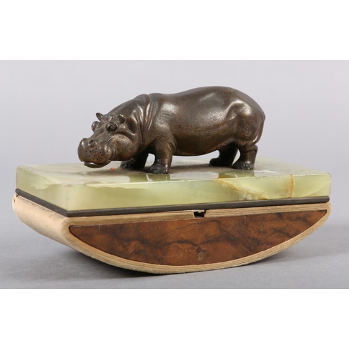 231 - AN ASPREY OF LONDON ONYX INK BLOTTER with a figure of a bronze effect hippopotamus, stamped Asprey L... 