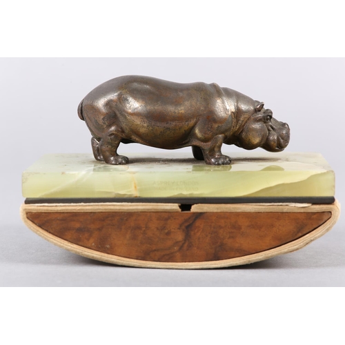 231 - AN ASPREY OF LONDON ONYX INK BLOTTER with a figure of a bronze effect hippopotamus, stamped Asprey L... 