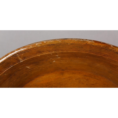 175 - A LATE 18TH/EARLY 19TH CENTURY LARGE FRUITWOOD BOWL, ring turned and shallow with a wide rim, flat b... 