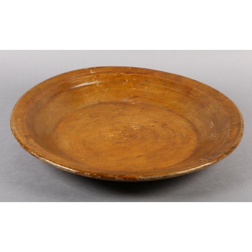 175 - A LATE 18TH/EARLY 19TH CENTURY LARGE FRUITWOOD BOWL, ring turned and shallow with a wide rim, flat b... 