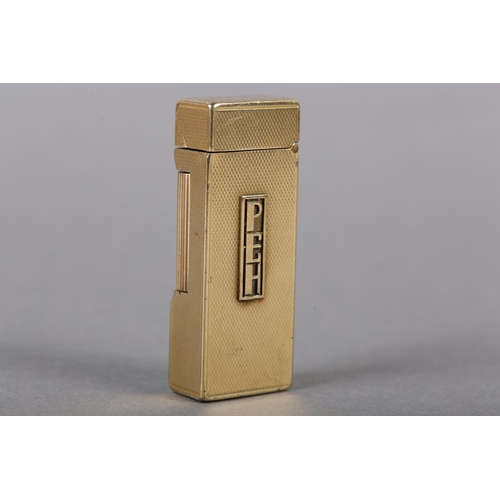 343 - A DUNHILL CIGARETTE LIGHTER in 9ct gold, London 1952 for Alfred Dunhill, roller flint, fluid action,... 