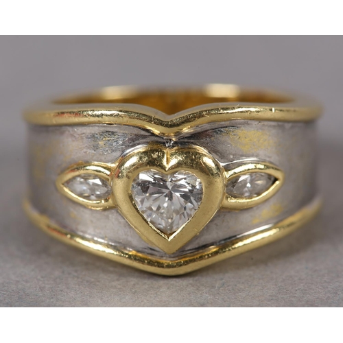 371 - A THREE STONE DIAMOND RING collet set in yellow metal to the centre with a heart shaped faceted ston... 