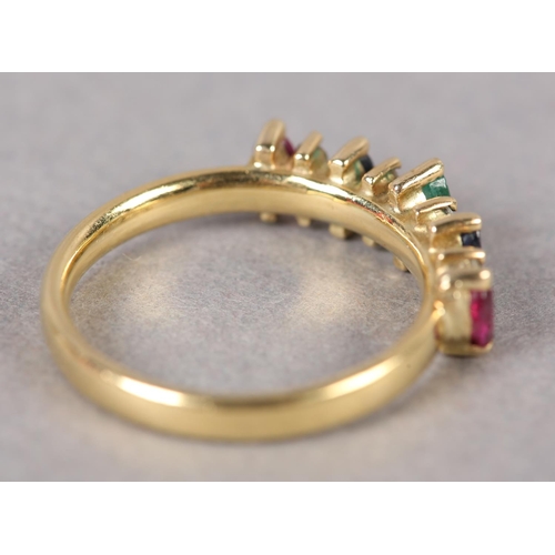 372 - A RUBY, DIAMOND, SAPPHIRE AND EMERALD RING in 18ct gold, the marquise cut coloured stones claw set i... 