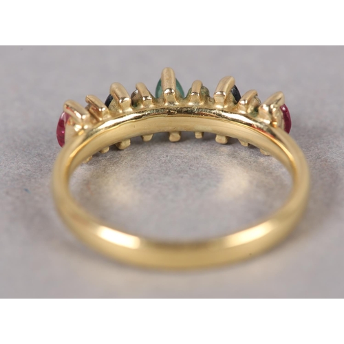 372 - A RUBY, DIAMOND, SAPPHIRE AND EMERALD RING in 18ct gold, the marquise cut coloured stones claw set i... 