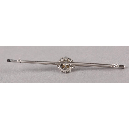 350 - A CULTURED PEARL AND DIAMOND CLUSTER BAR BROOCH, the 5mm pearl raised against a surround of claw set... 