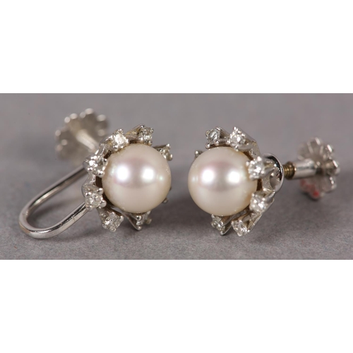 351 - A PAIR OF CULTURED PEARL AND DIAMOND CLUSTER EARRINGS, the 6.5mm pearl within a surround of brillian... 