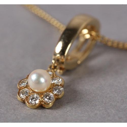 347 - A CULTURED PEARL AND DIAMOND CLUSTER PENDANT in 18ct gold, the 4mm pearl raised against a surround o... 