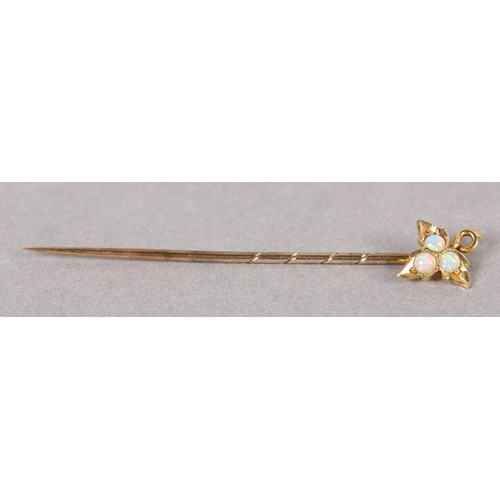 390 - A LATE VICTORIAN OPAL STICK PIN in 15ct gold with 9ct gold pin, the three circular cabochon stones g... 