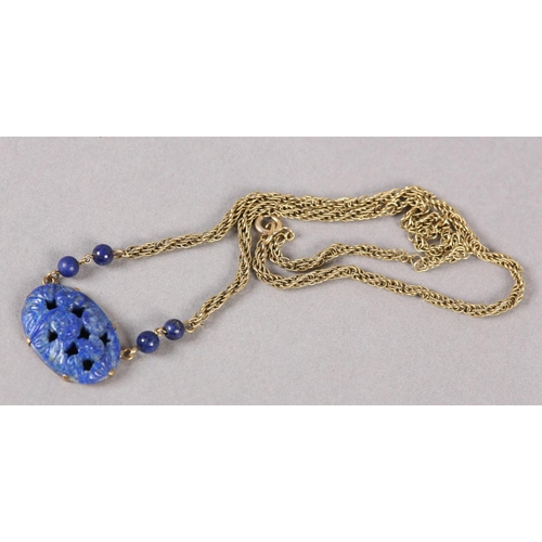 369 - A SODALITE NECKLACE  c1950 in 9ct gold, the foliate pierced and carved oval cabochon claw set, flank... 