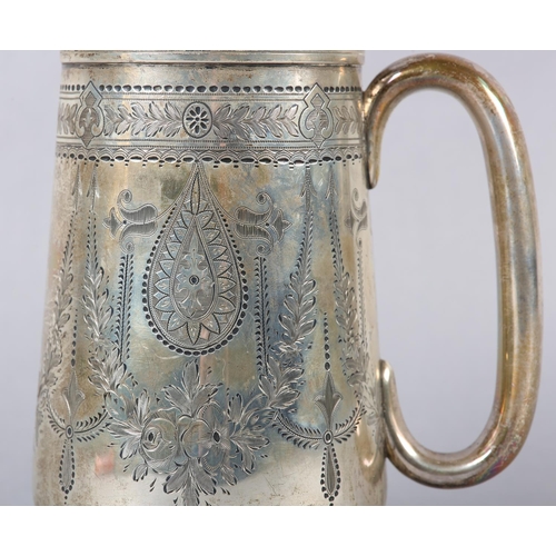 325 - A VICTORIAN SILVER TANKARD, Exeter 1879, for Josiah William & Co, all over foliate swag engraved wit... 