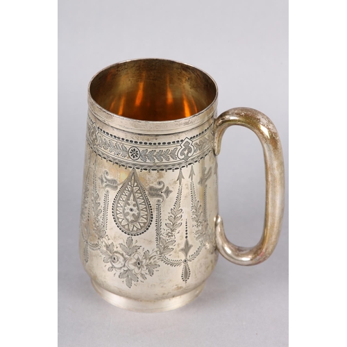 325 - A VICTORIAN SILVER TANKARD, Exeter 1879, for Josiah William & Co, all over foliate swag engraved wit... 