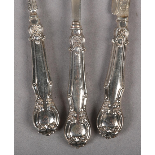 323 - A VICTORIAN THREE PIECE CHRISTENING SET in silver, Birmingham 1861 for George Unite, the fork, spoon... 