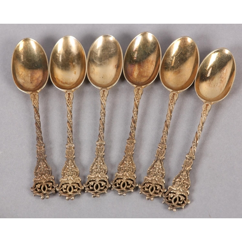 329 - A SET OF SIX VICTORIAN SILVER GILT TEASPOONS AND SUGAR TONGS, London 1895 for Wakely & Wheeler, each... 