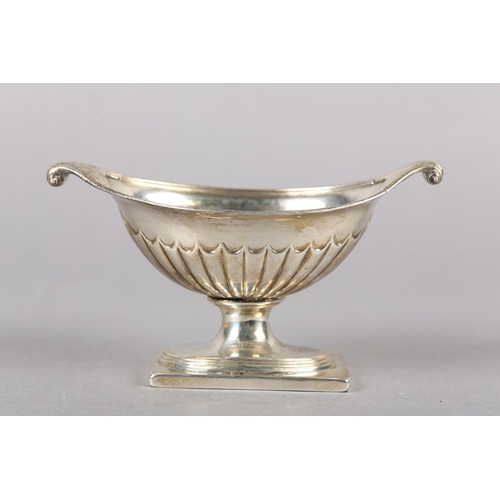 326 - A GEORGE III SILVER SALT, London 1794 for William Fountain, boat shape with scroll handles, reeded o... 