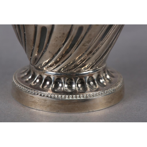 324 - A VICTORIAN SILVER MUFFINEER , London 1892 for Samuel Jacob, wrythen chased with foliate band over w... 