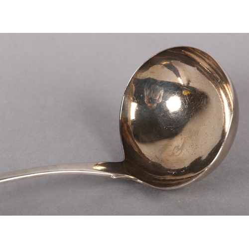 307 - A GEORGE III IRISH SILVER SOUP LADLE, Dublin 1804, Samuel Neville, fiddle back, approximate length 3... 