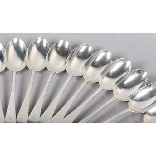 317 - A SET OF TWELVE GEORGE V SILVER DESSERT SPOONS 1923 for Wakely & Wheeler, Hanoverian pattern with la... 